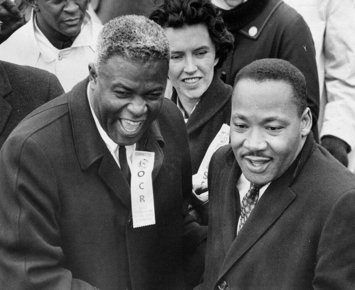 Jackie Robinson wore an Organization for Civil Rights badge when he took part in a Louisville march with Dr. Martin Luther King in 1964.