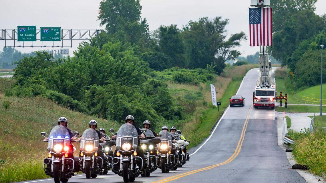 Police officers leave after attending the public visitation held at Vineyard Church Tuesday for North Kansas City Police Department Officer Daniel Vasquez who was killed last week while on duty.
