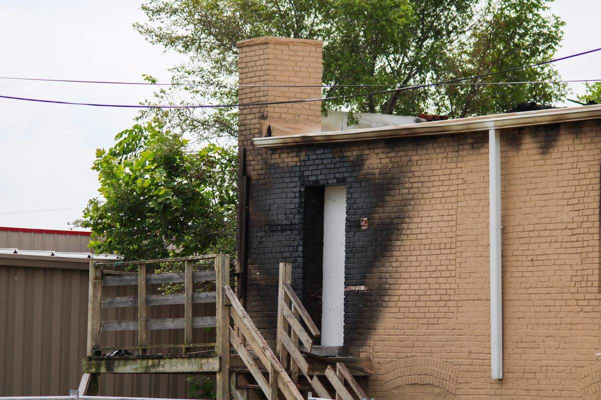 Fire damage is seen on the rear of Kortnee Fielder’s building at 2308 Truman Road in Kansas City. The building has been in her family for four generations.