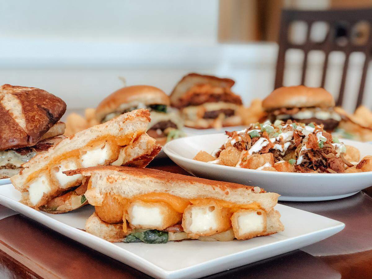 Epic Burgers’ Over the Top Grilled Cheese with four mozzarella sticks, provolone and cheddar cheese.