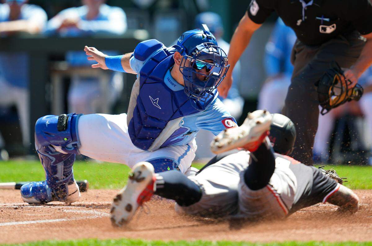 Kansas City Royals catcher Freddy Fermin tags out Minnesota’s Jose Miranda in a thrilling play at the plate during the first inning of Sunday afternoon’s game at Kauffman Stadium.