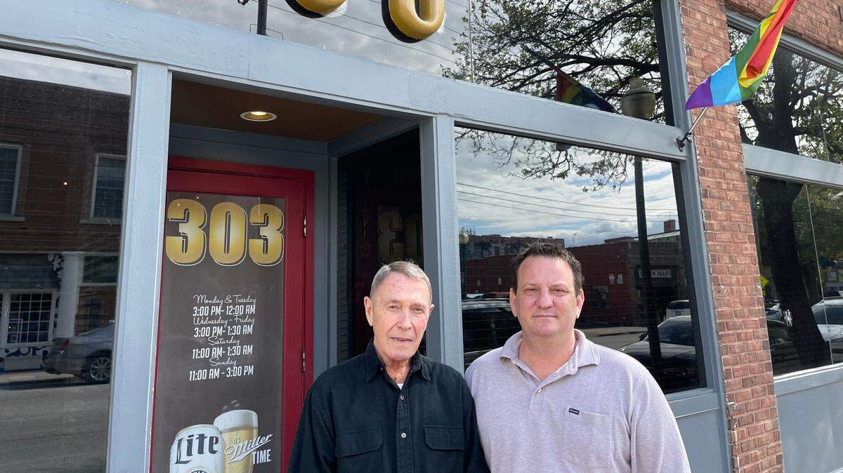 Bistro 303 co-owners Gene Switzer, left, and Jeffrey Schmitz feel fortunate that none of their patrons and employees were injured when stray bullets from a shooting Saturday afternoon pierced the glass windows to their restaurant in Westport. Two people sustained non-life threatening injuries in the shooting.