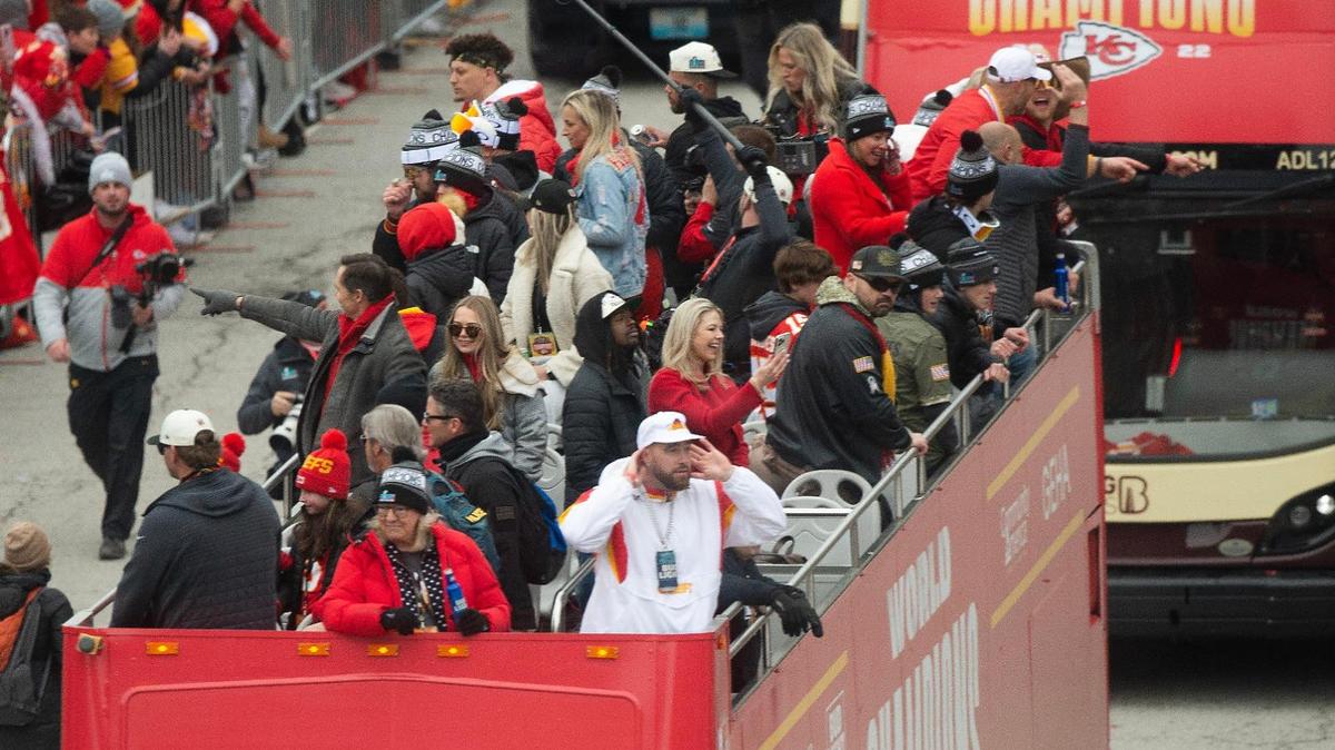 Kansas City Chiefs tight end Travis Kelce was on the front of one of the buses with Chiefs players during the Kansas City Chiefs Super Bowl LVII victory parade Wednesday, Feb. 15, 2023, in downtown Kansas City.