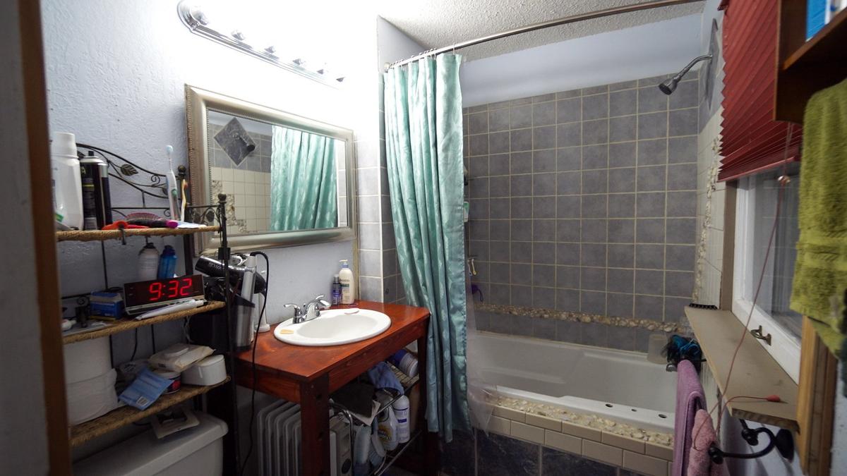 Jenna Squires did almost all of on her own work at her house. She also bartered for services.