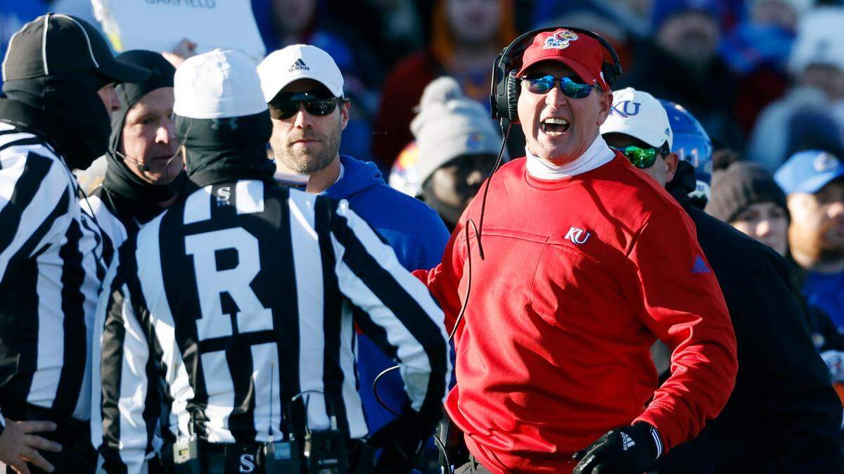 Kansas head coach Lance Leipold (right) reacts to a roughing-the-passer penalty called on Texas during the second quarter on Saturday, Nov. 19, 2022, in Lawrence.