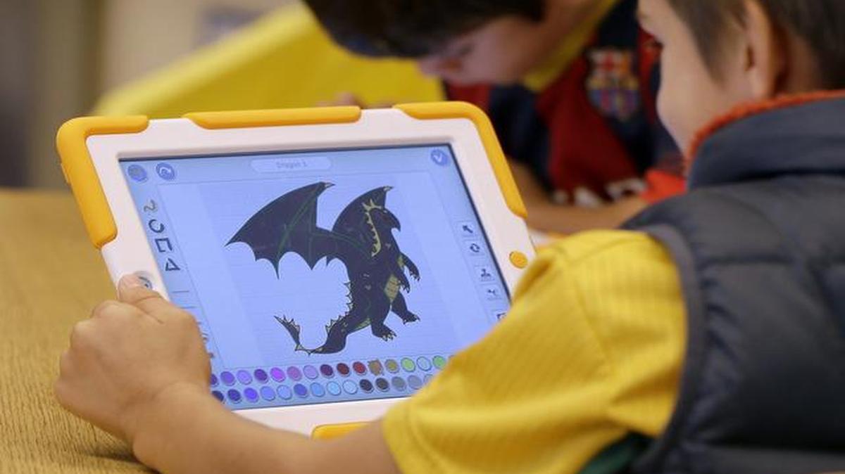 
Aiden Crott, 7, recently worked with his ScratchJr program on an iPad at the Eliot-Pearson Children’s School in Medford, Mass. 
