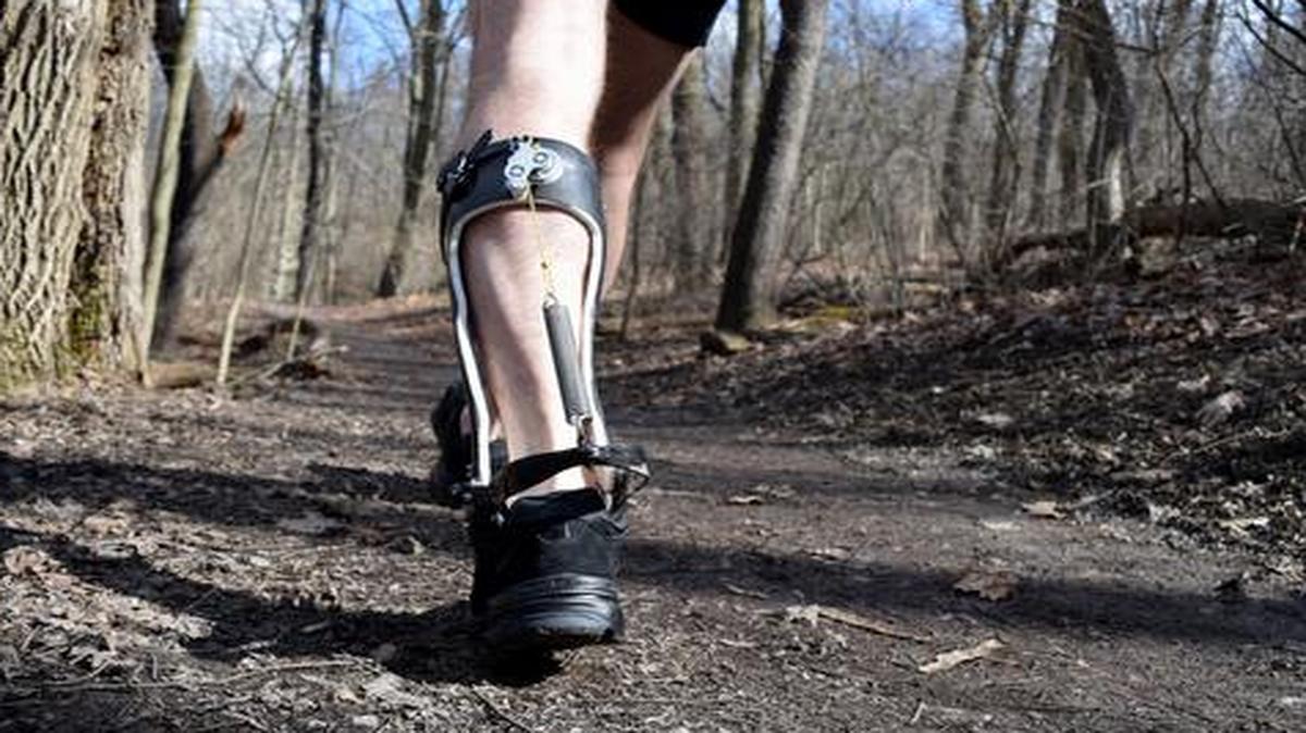 
This handout photo provided by Carnegie Mellon University shows an exoskeleton boot on a person walking in a park in Pittsburgh. 
