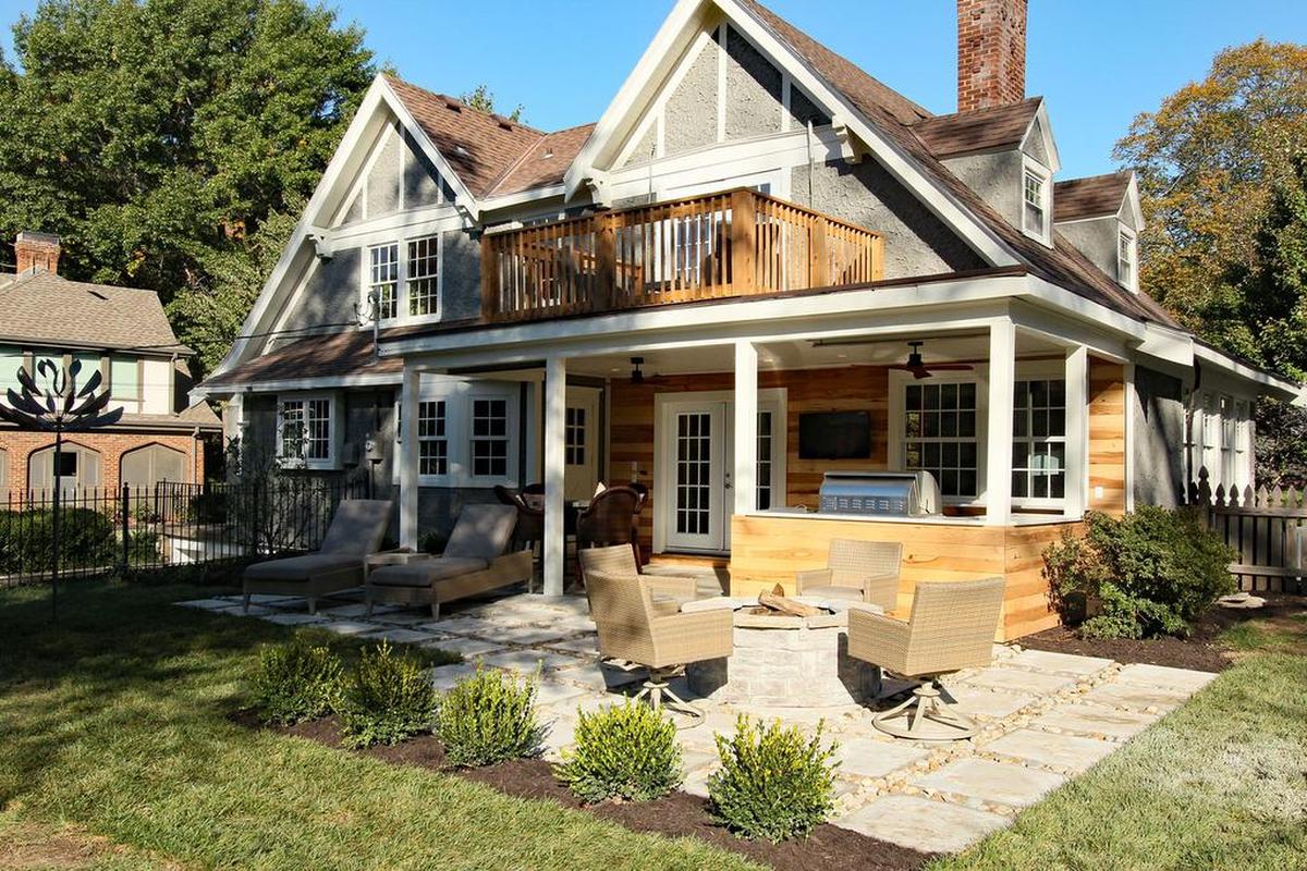 Tamara Day, star of DIY Network’s “Bargain Mansions” created an outdoor living room with a fire pit in the backyard of a Tudor style home near 61st Street and Ward Parkway.