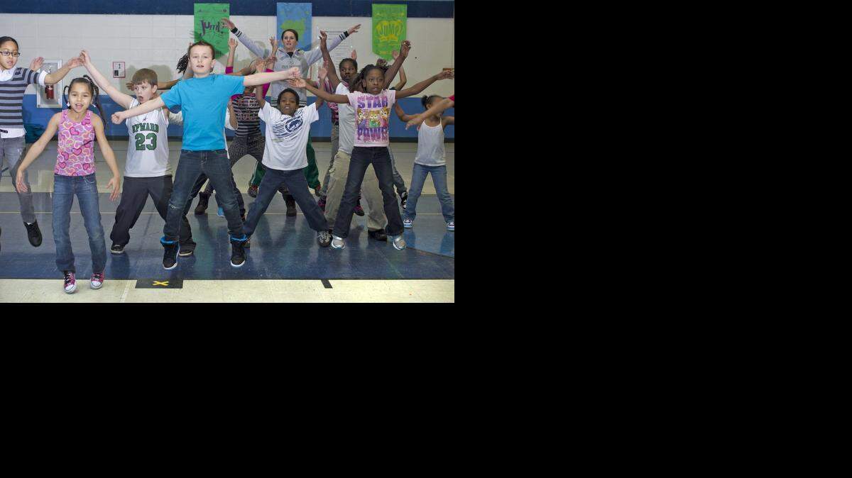 
Third-graders in Laura Girard’s physical education class demonstrated their jumping jacks at Spring Valley Elementary School in Raytown earlier this year.
