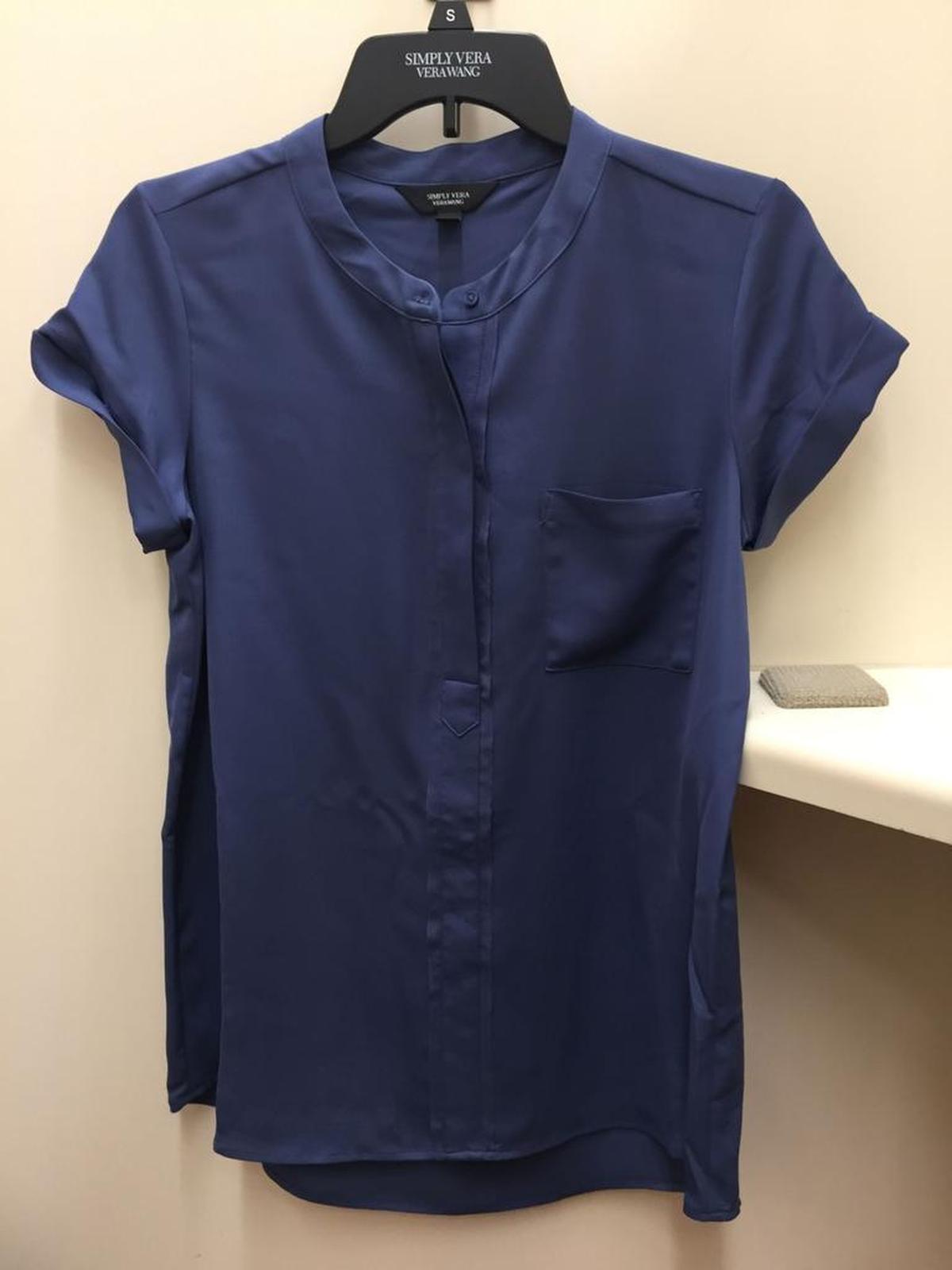 This fitted blue blouse with industrial details would look perfect with swingy trousers (Simply Vera Wang, $40).