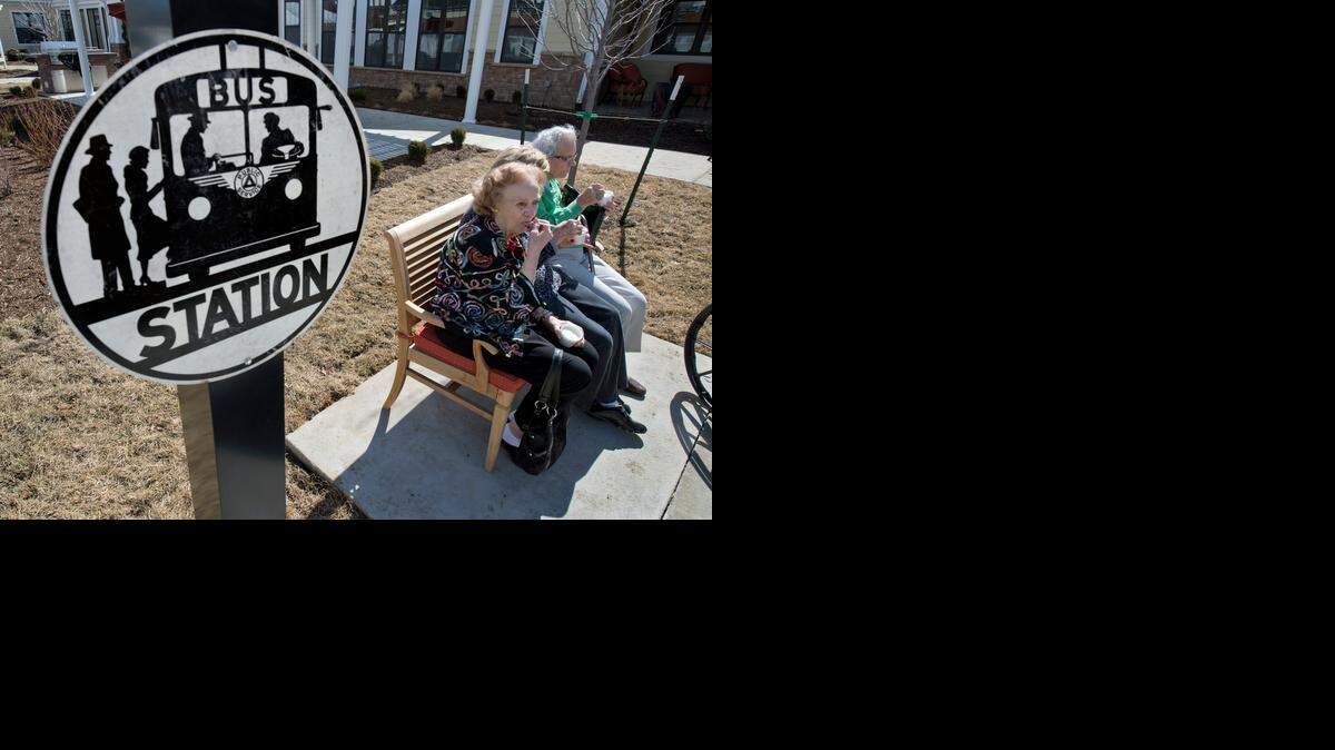 
A new memory care center at Wexford Place, a Kansas City retirement community, was designed with “destination stations” that stimulate residents’ memories. In the courtyard, there’s a “bus station” and an antique Studebaker car.
