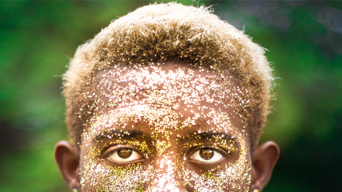 
STEVEN JAVON covered his skin and hair with gold glitter. In his artist statement, he wrote that the image is “related to his race and his identity within it. … In order to feel part of the majority he took the basic characteristics of the majority and applied those perceptions to himself. He straightened his hair and dyed it blonde.” Adding the glitter showed “he is proud of his color but wants to relate to the world that is around him.”
