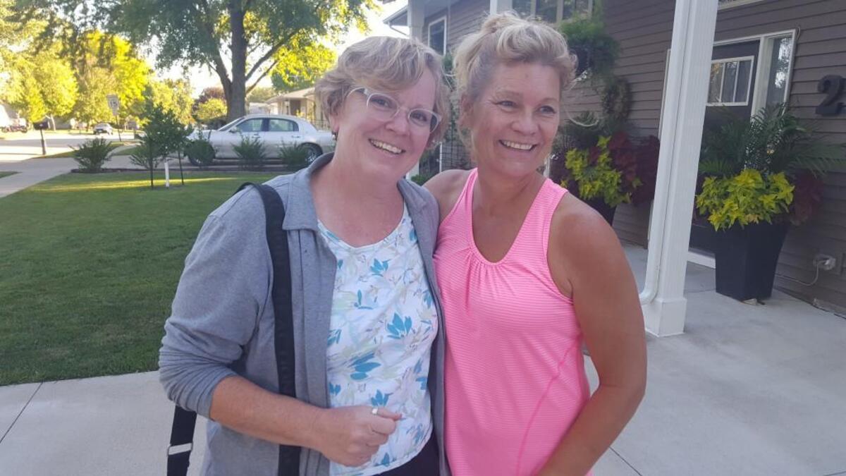 A missing mutt brought together Sue Montgomery, left, and Riverside, Iowa, resident Beth Cawiezell.
