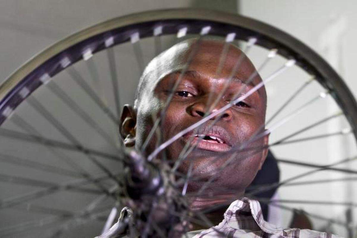 Abdoulie Fatajo came to the United States on a student visa in 1999 and started a business that now includes warehouses and several full-time and temporary employees.