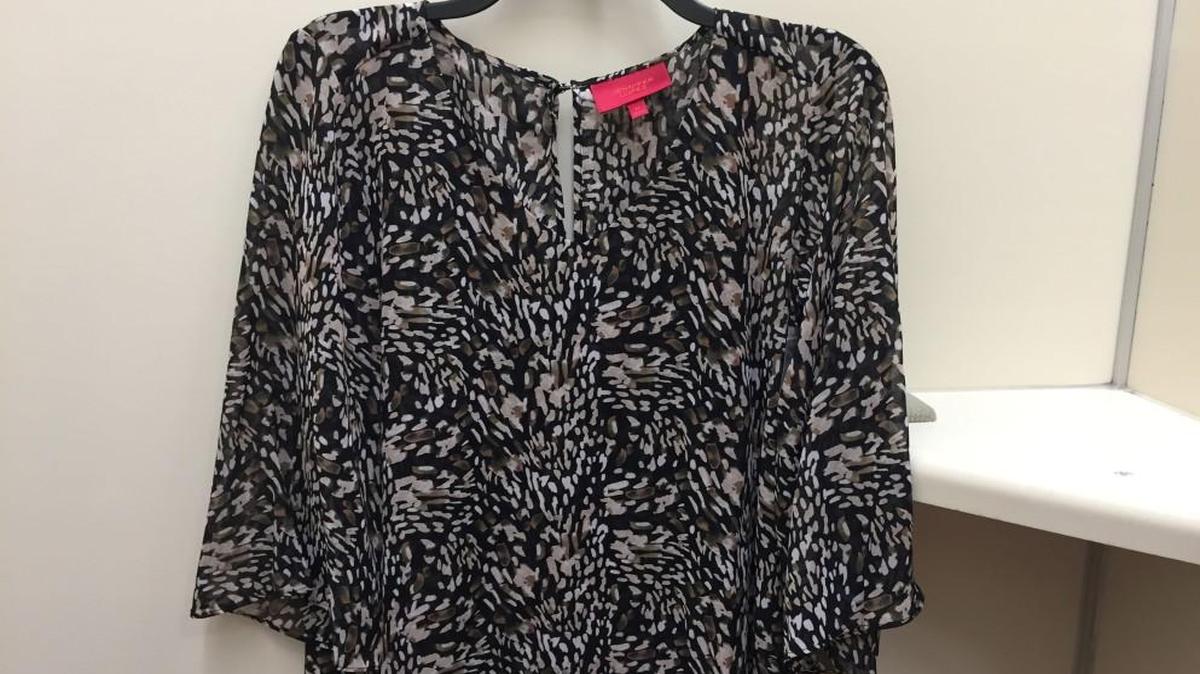 If you love busy patterns, this blousy top fits the bill (Jennifer Lopez, $48). The neutral colors help the pattern feel a little less zany. It would look great with black pants for a meeting with administrators or with jeans for a casual day.