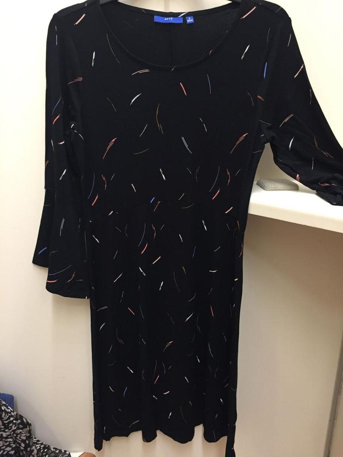 This knee-length swing dress (APT 9, $50) is stretchy, loose and modest — perfect for the classroom. It would be great now with sandals or flats and even better in a couple of months with tights and boots. The bell sleeves are on-trend, and the paint slash pattern will likely disguise any weird stains (Elmer’s Glue? Someone’s lunch? Coffee?).