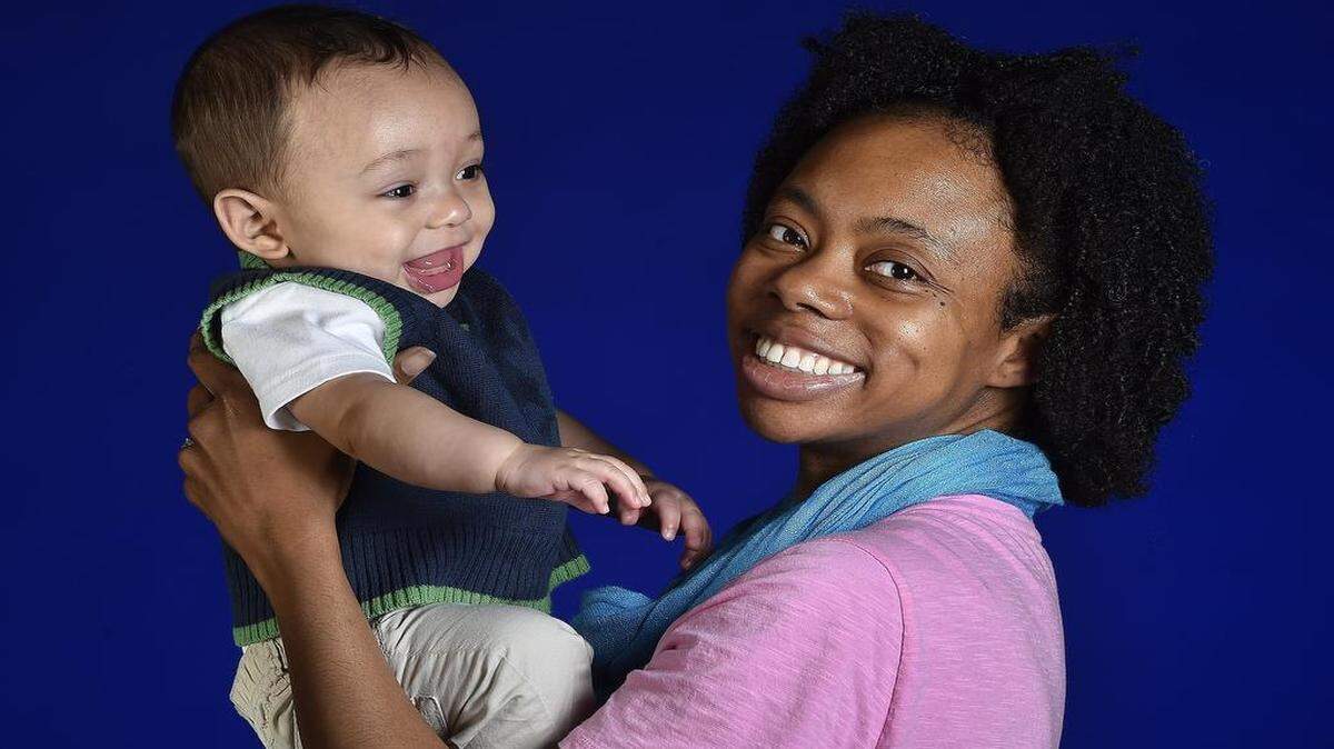 
Pamela Spencer and baby Tommy. 
