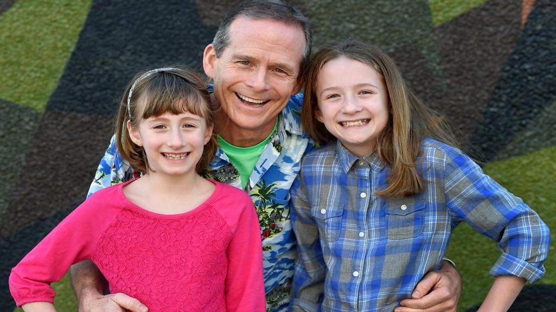 
Jim Cosgrove and his daughters
