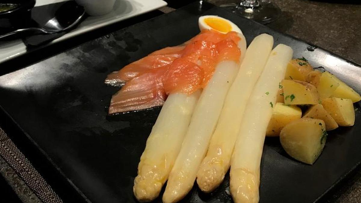 A pound of white asparagus imported from Limburg, the Netherlands, served at Affare in the Crossroads Arts District with drawn butter, hollandaise, smoked salmon, cooked egg, new potatoes and the German white wine Gruner Silvaner.