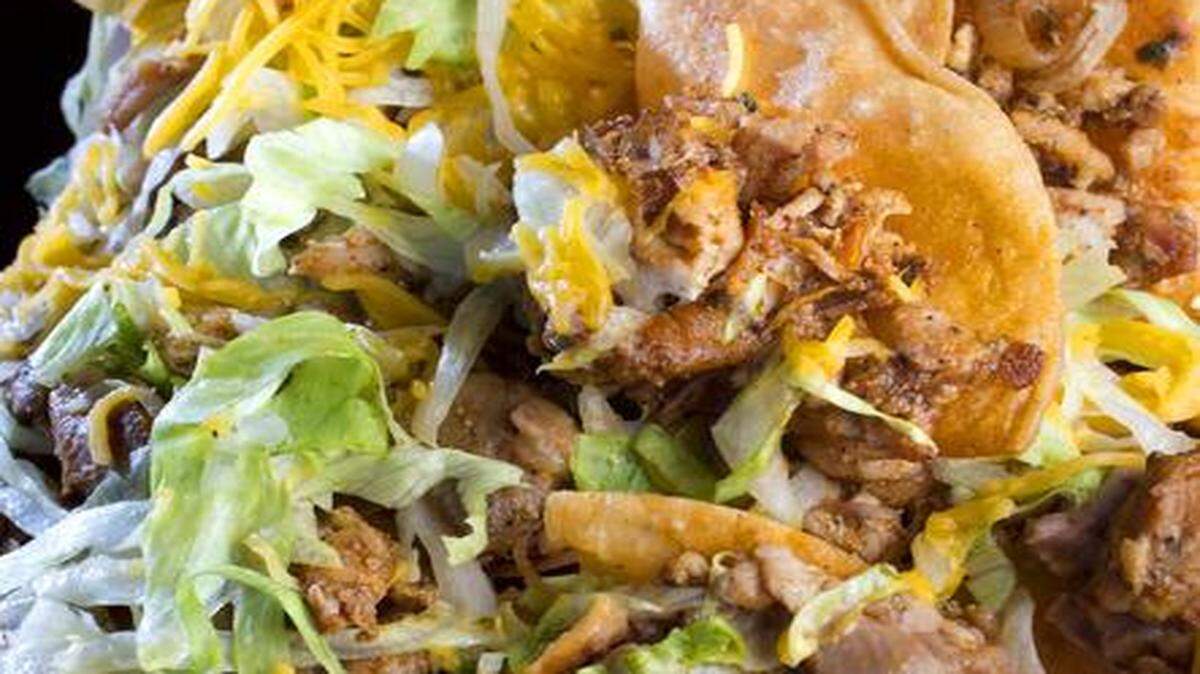 
The loaded nachos ($3.99) from Reyna’s Express included chips, ground beef, beans, cheese, iceberg lettuce and pico de gallo.



