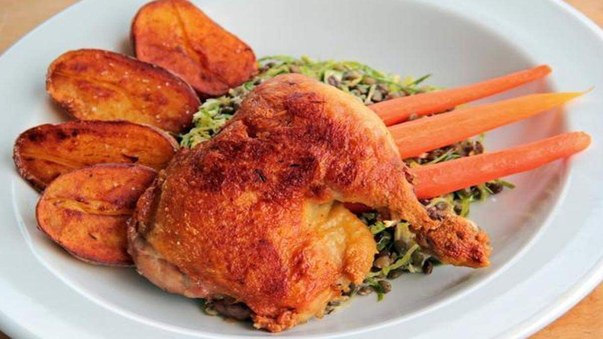 Duck confit is a classic dish. Chicken is less expensive and works well for home sous vide preparations. Serve with crispy potatoes and a lentil salad.