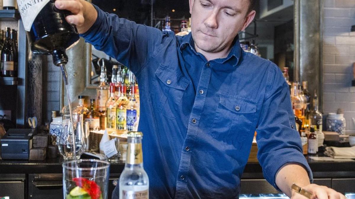 Beverage director Scott Tipton makes his No. 1 Spanish-style gin and tonic at República in the Country Club Plaza. The customer is given the tonic water separately to add at their convenience.