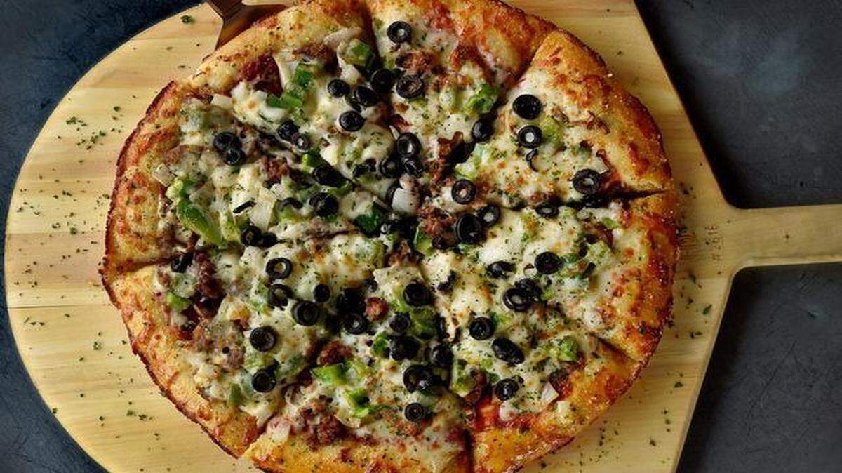 
A 39th Street Pizza at Artego pizza features the restaurant’s thick crust.
