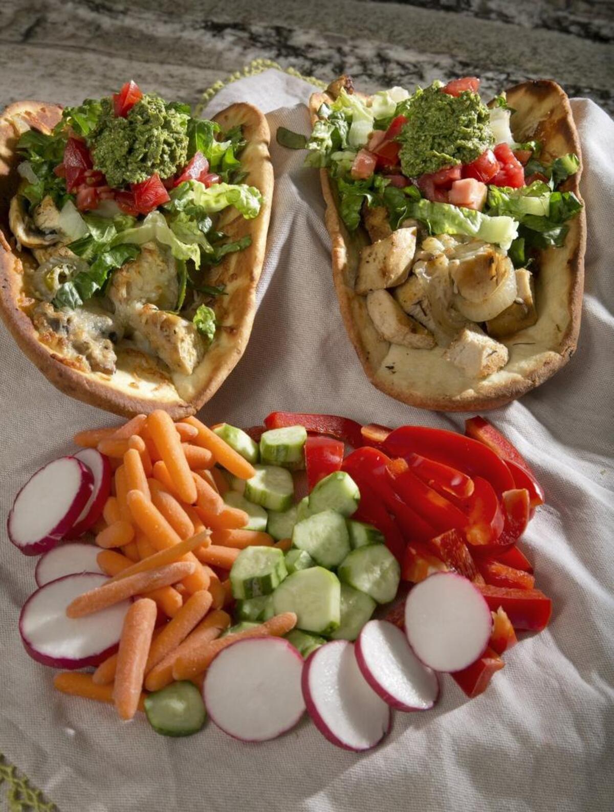 Lisa Thompson's Blackened Chicken Naan Sandwiches with Spinach Basil Tapenade.