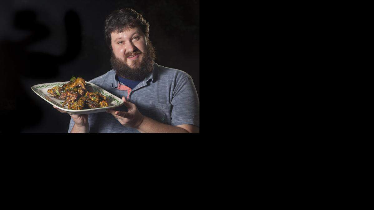 
English teacher Kyle Hopkins enjoys cooking and entertaining. He shares his recipe for Chicken Wings.
