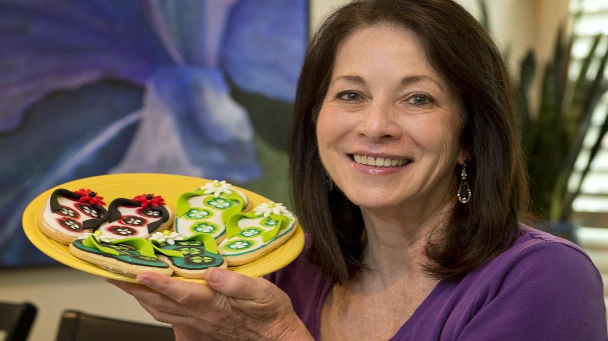 
Jane Haynes of Lenexa creates “flip-flop” cookies as a summer treat.
