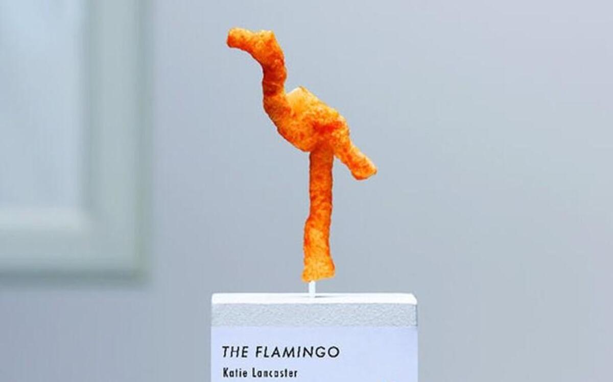 Cheetos is looking for the most uniquely shaped cheesy snack in the land — and it could be worth $50,000 to someone. This flamingo-shaped Cheeto is displayed at the temporary Cheetos Museum in Times Square.