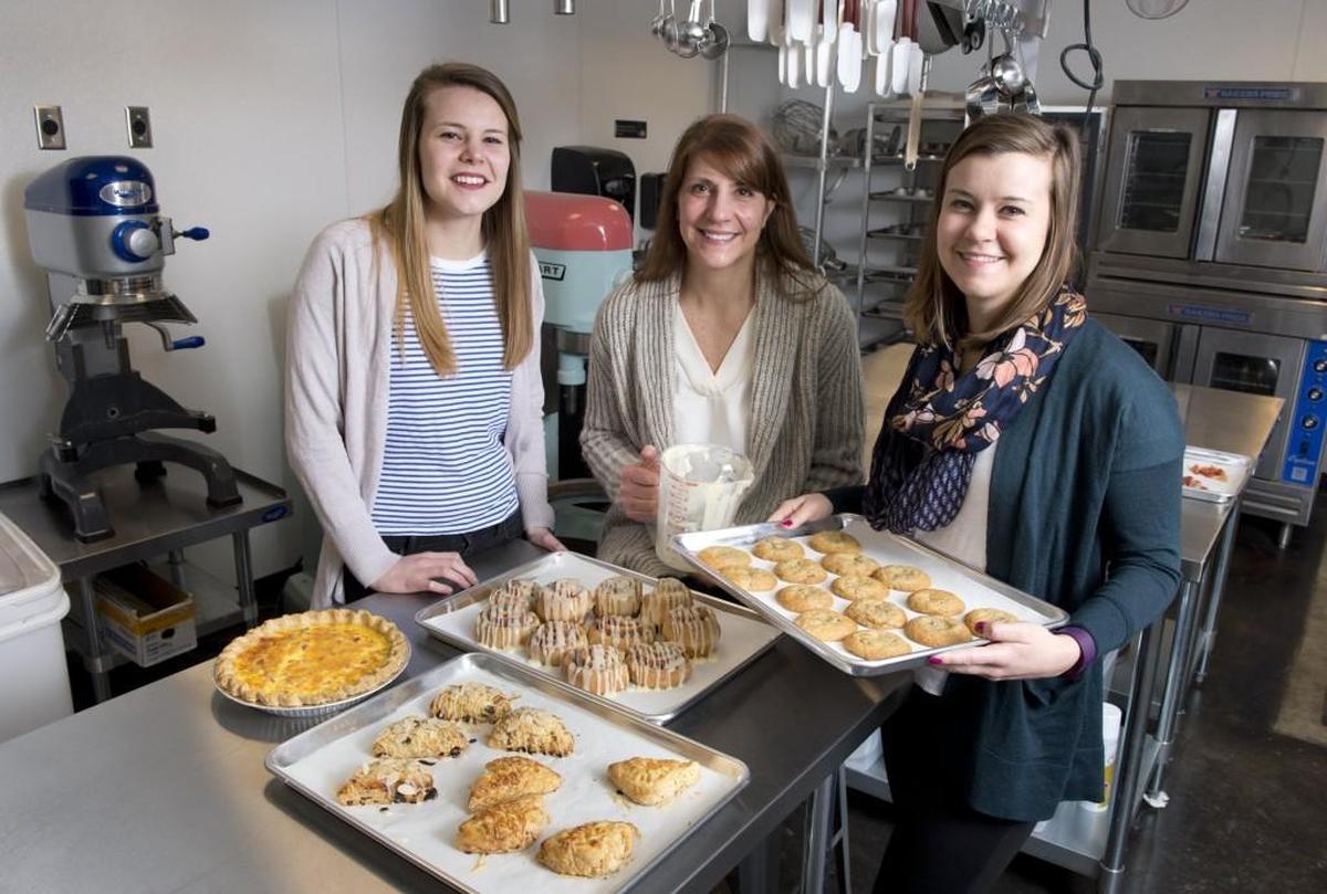 Robin Knight, center, started Emily Kate’s, a gluten-free bakery, after her daughters Katie and Emily were diagnosed as gluten-intolerant.