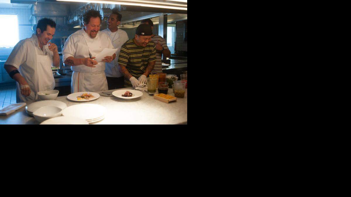 
“Chef” actors John Leguizamo (from left), Jon Favreau and Bobby Cannavale received behind-the-scenes instruction from chef Roy Choi, who served as a technical consultant to the production.


 


