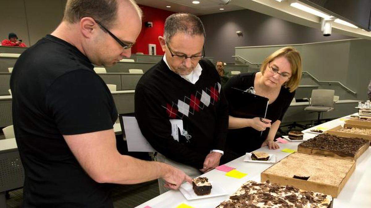 
Judges Christopher Elbow (from left), Baltazar Fernandez and The Star’s Jill Silva discussed one of the entries.

