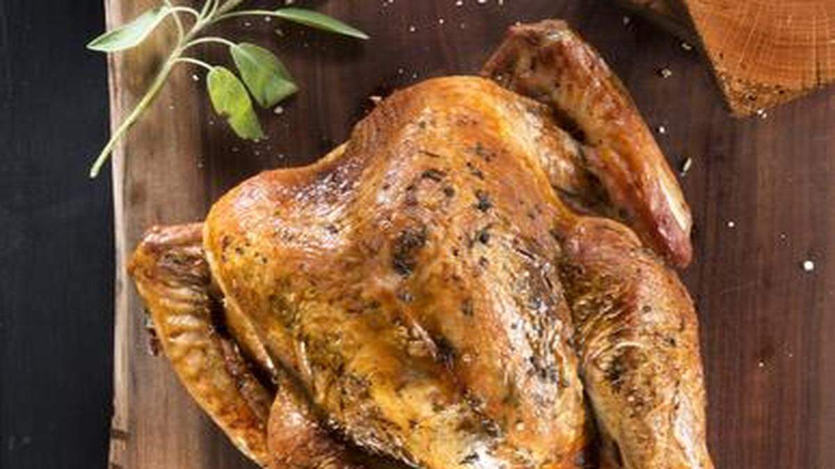 
This year, our special Thanksgiving food section celebrates the local artisan. This turkey -- recipe by Alex Pope of Local Pig -- sits on a Wild Woods board made by Rick Maude of Kansas City. Also note the salt box at top right corner made by Shawn Wilkinson of Overland Park.
