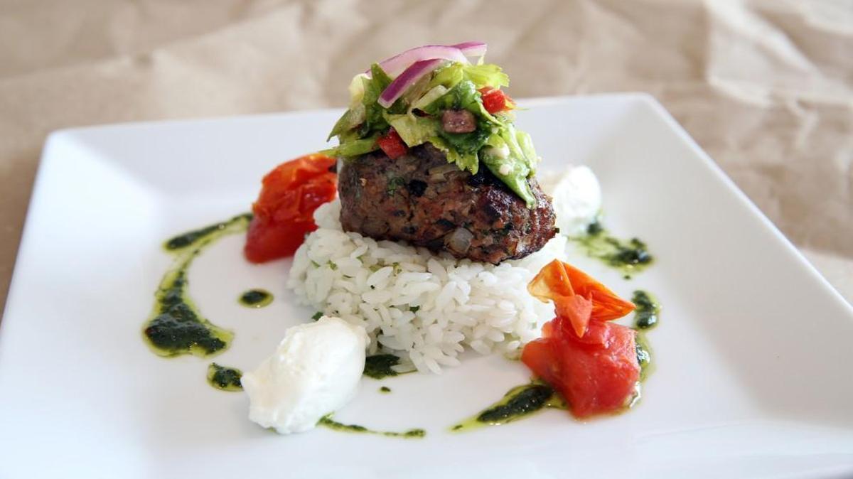 Sheftalia served over jasmine rice