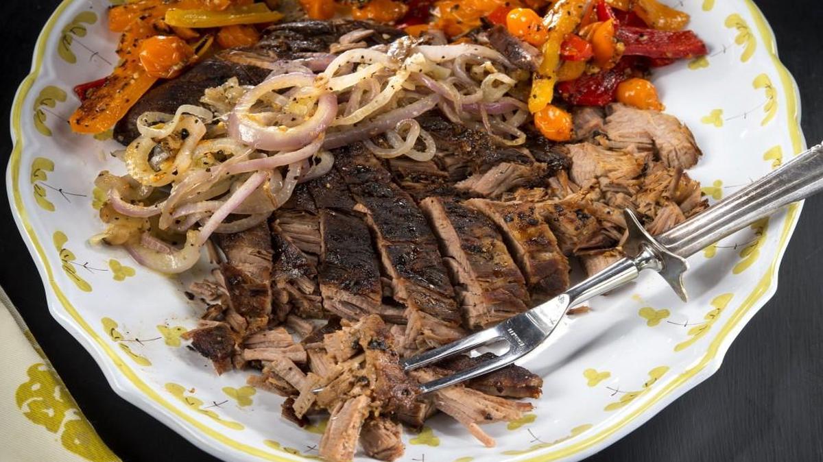 It takes less than two hours to cook brisket in an Instant Pot. Serve with onions and roasted vegetables.