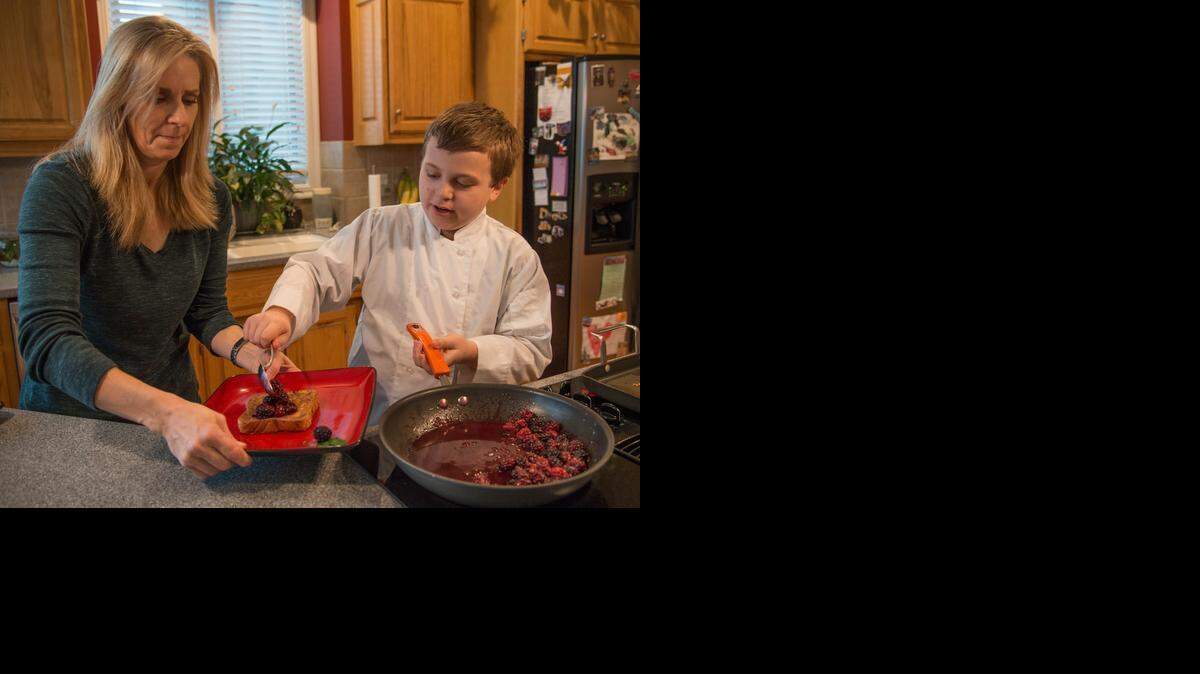 
Deliece Hofen helped her son Zach as he made French toast recently. 

