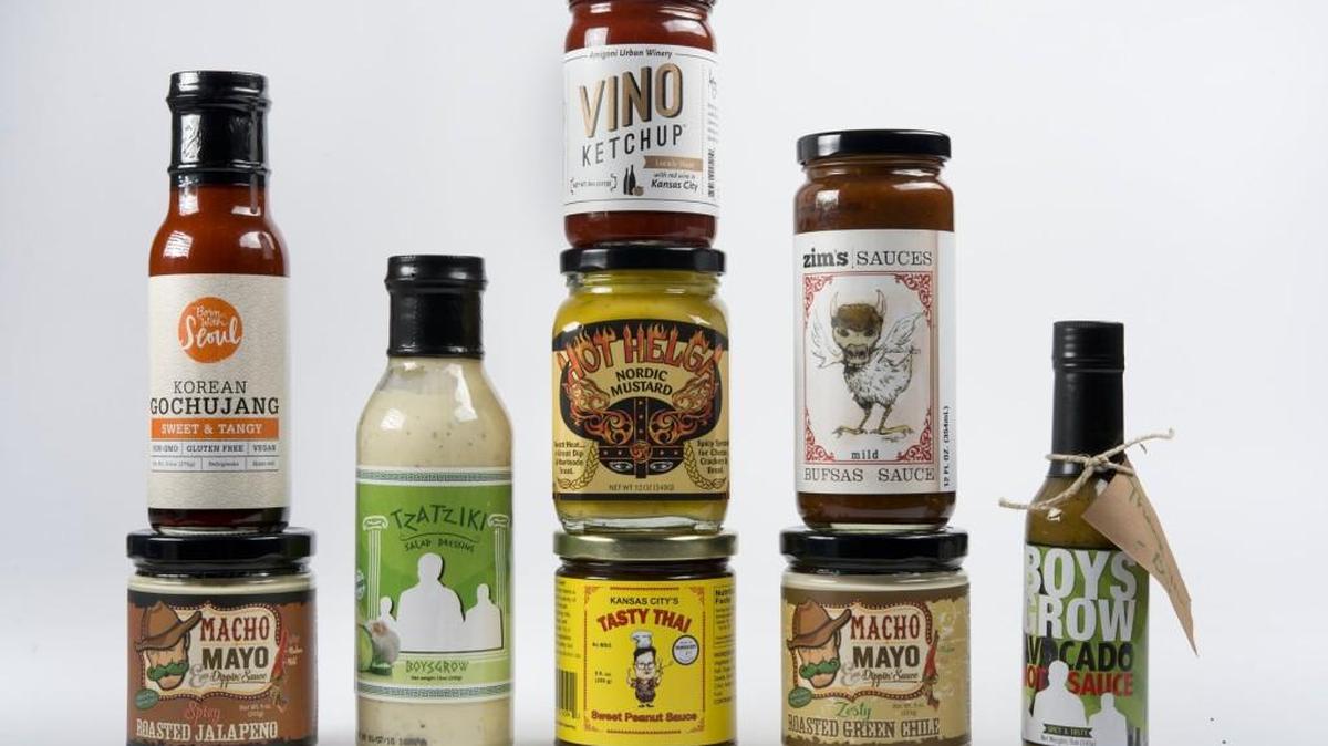 Locally made condiments include (from left) Born With Seoul Korean Gochujang Sweet & Tangy, Macho Mayo Spicy Roasted Jalapeno Dippin’ Sauce, Boys Grow Tzatziki Salad Dressing, Kansas City’s Tasty Thai Sweet Peanut Sauce, Hot Helga Nordic Mustard, Amigoni Urban Winery Vino Ketchup, Macho Mayo Roasted Green Chile Dippin’ Sauce Zesty, Zim’s Bufsas Sauce and Boys Grow Avocado Hot Sauce.
