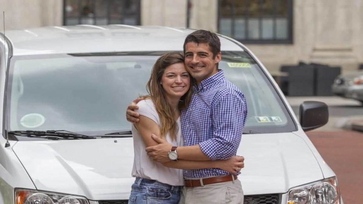 Melissa Schipke, left, and Nick Marzano met in an UberPool six months ago, and now they're engaged. They standing in front of an Uber vehicle they called to take them home.
