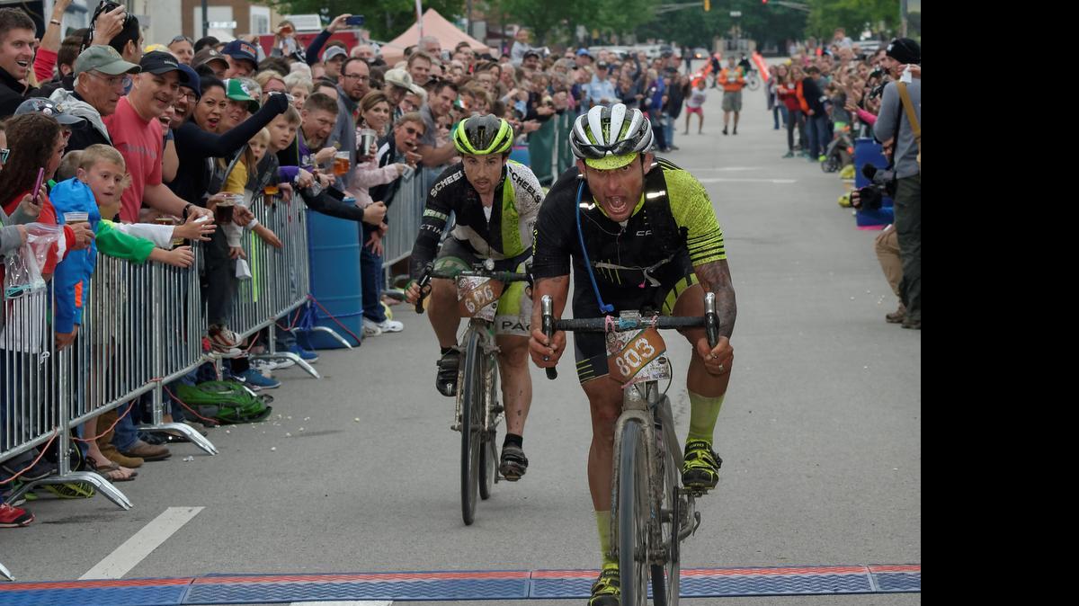 
Yuri Hauswald, right, of Petaluma CA beat Michael Sencenbaugh  by a half second in a sprint to the finish line after 200 miles in muddy conditions to win the 2015 Dirty Kanza 200. Sencenbaugh, from Carrolla, Iowa, had led the race most of the day. Hauswald's winning time was 13 hours, 1 minute, 18 seconds.
