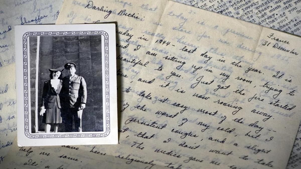 
Writer Mike McGraw will be reading some of the hundreds of letters his father, Bill McGraw, wrote to his mother, Ruth McGraw, during World War II at the National WWI Museum and Memorial. This is a World War II era photograph of Ruth and Bill McGraw, with some of the letters he wrote to her. 
