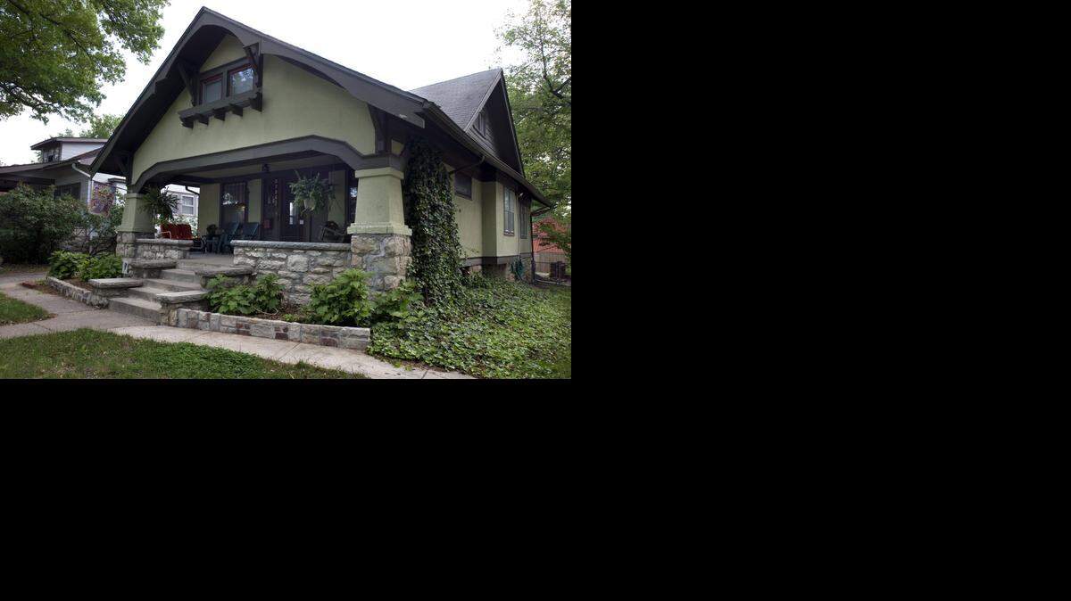 Jan Bentley of Kansas City owns a classic Craftsman bungalow with exposed wood brackets and rafter tails supporting wide overhangs.