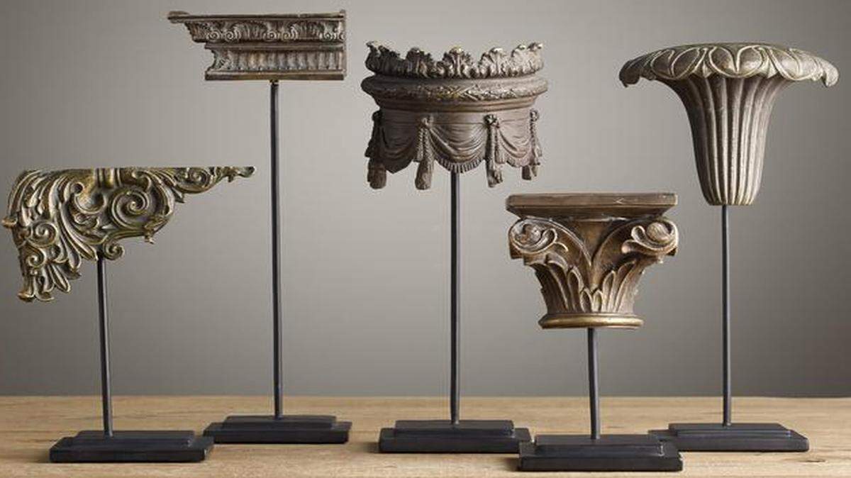 
 These brass architectural ornaments represent several of the Greco-Roman motifs, including acanthus leaves, scrolls and vines. 
