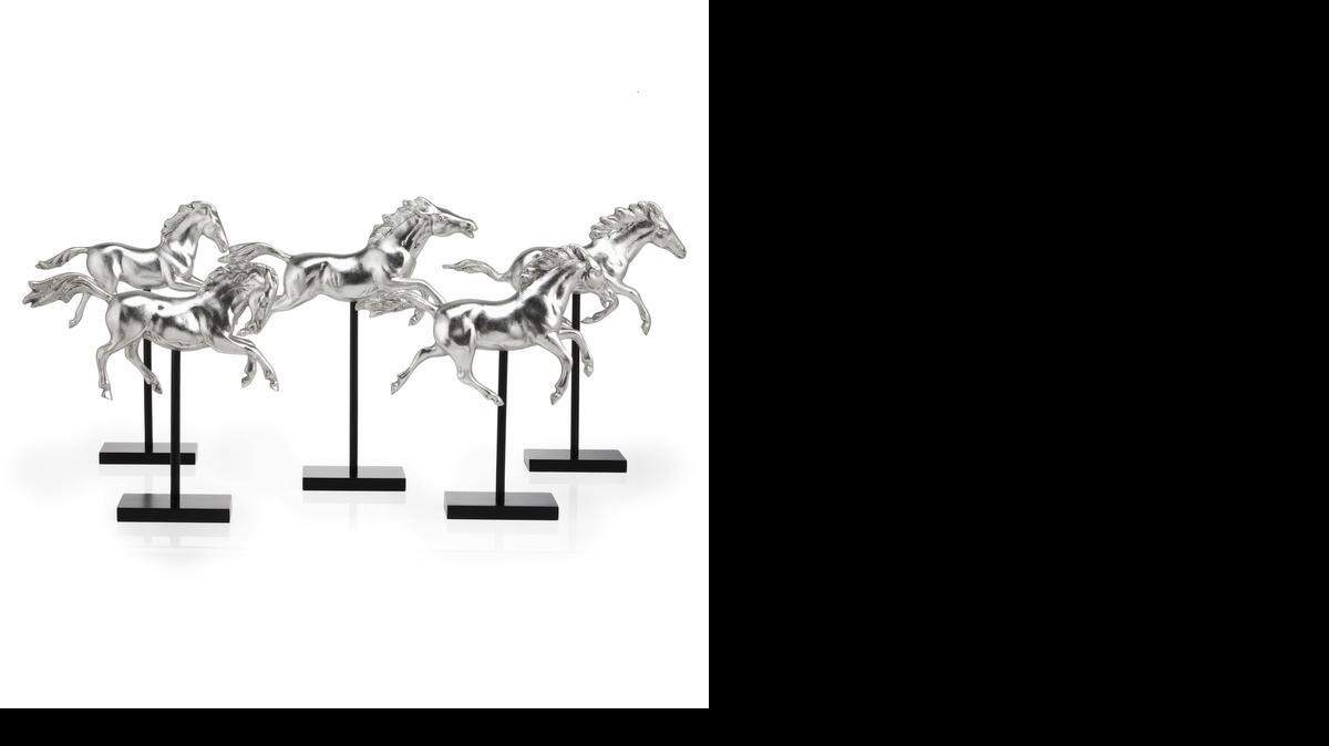 
Silver metallic paint on cast resin creates a glamorous accent on this herd of galloping horses from Z Gallerie.


