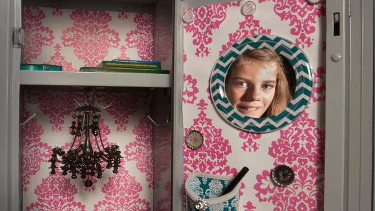 The school locker of sixth-grader Lauren Herinckx certainly reflects her decorating tastes. In fact, that’s Lauren reflected in a mirror in her locker, which also boasts pink wallpaper and a battery-operated mini-chandelier. She attends Lakewood Middle School in Overland Park.