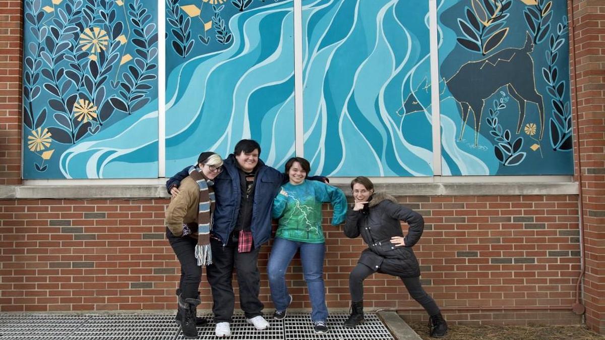 Posing with their work in 2014, students from the Kansas City Art Institute showed off the art they created to decorate the vacant Scarritt Elementary School at 3509 Anderson Ave.