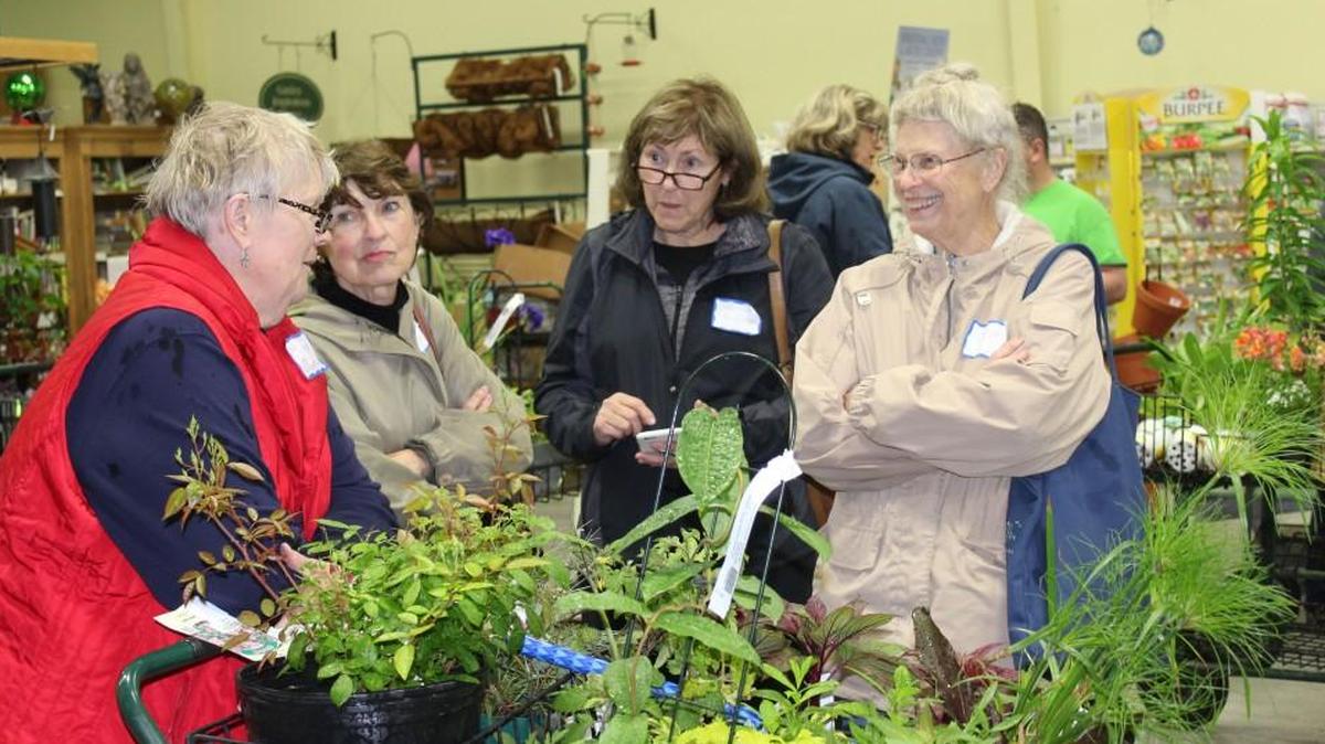 In April 2017, Gardeners Connect took its Plantaholic Frolic bus tour to Arnold’s Greenhouse in LeRoy, Kan., one of a number of such trips the organization sponsors. Dianne Swann (from left) shares notes with Janell Moore, Carmen Martinache and Doris Bergman.