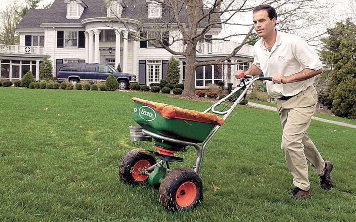 Fertilize in May only if you water frequently in the summer to maintain a lush, green lawn.
