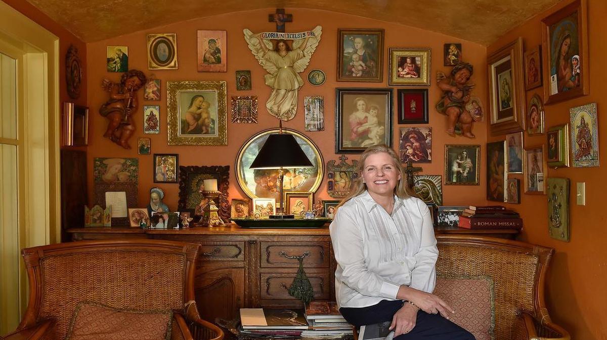 
Louise Meyers, owner of Pryde’s in Westport, decorates her home with an extensive collection of religious art and relics. Meyers said she and her husband read newspapers daily in this nook.
